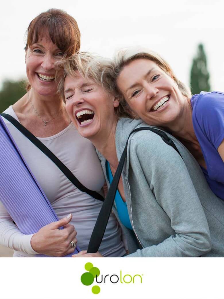 Three middle aged women laugh and embrace - this is a promotional photo used for Urolon treatment for leaky bladder and stress incontinence.